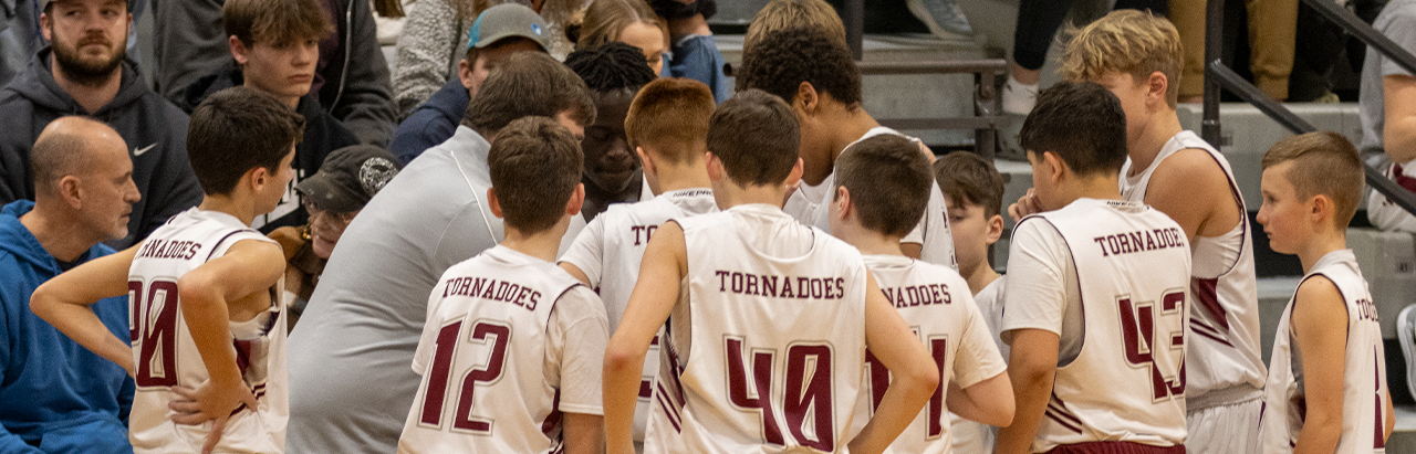 7th Grade Boys Basketball huddle